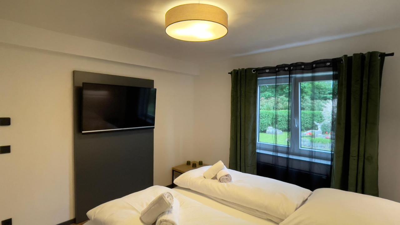 Uraha Apartments แฮร์โซเกนเอารัค ภายนอก รูปภาพ