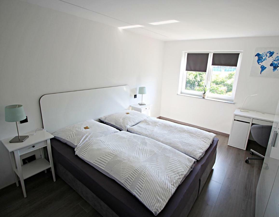 Uraha Apartments แฮร์โซเกนเอารัค ภายนอก รูปภาพ
